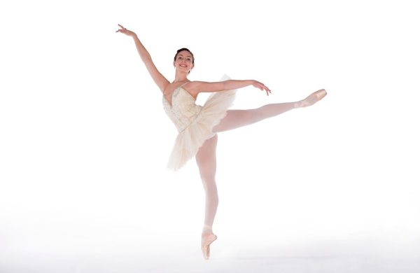 Ballerina in tutu arabesque pose